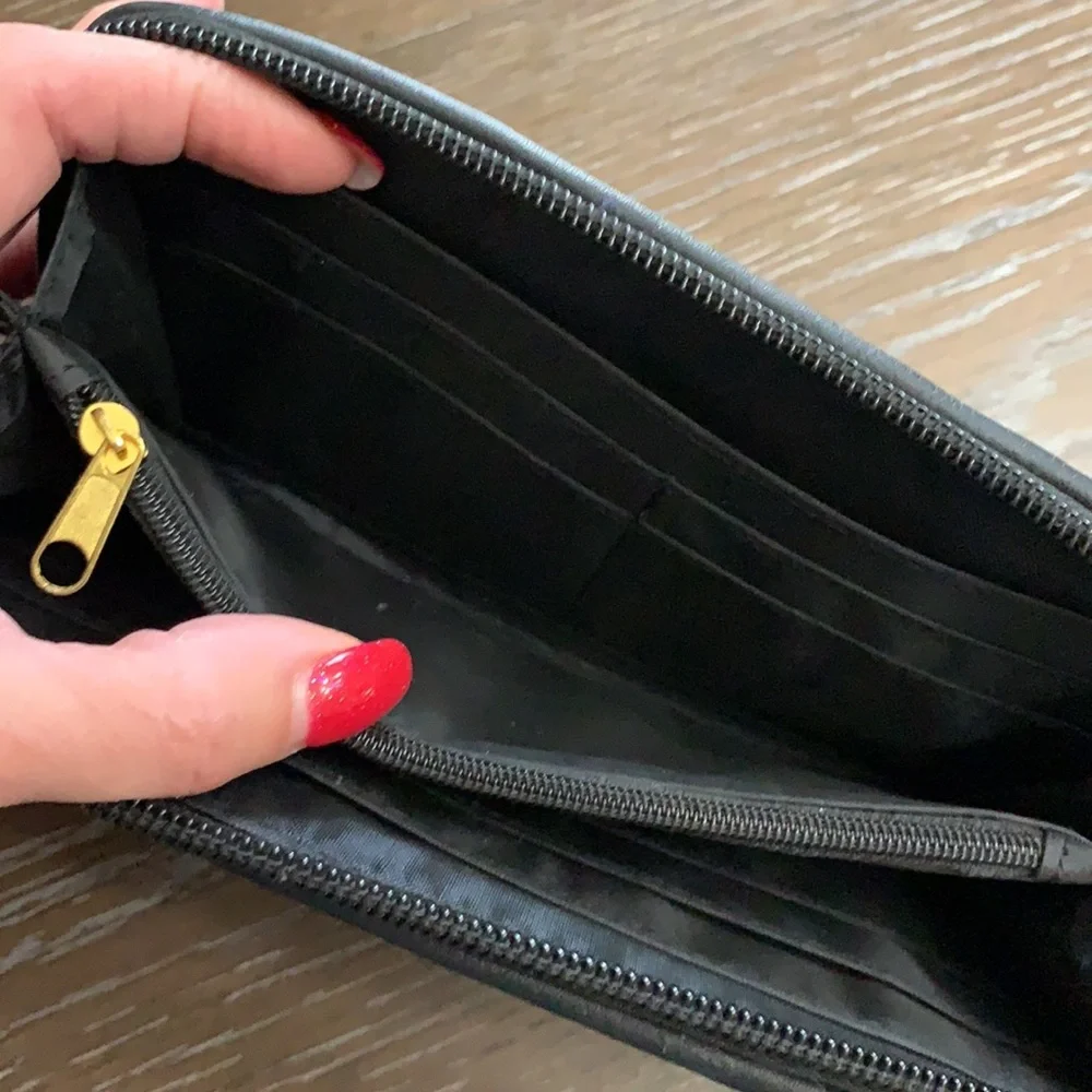 Unbranded black with black brads wristlets